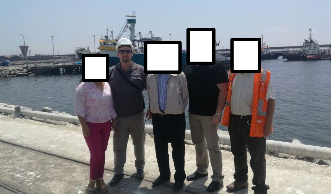 Nathan Hall at the Chimbote Port With Local Port Officials